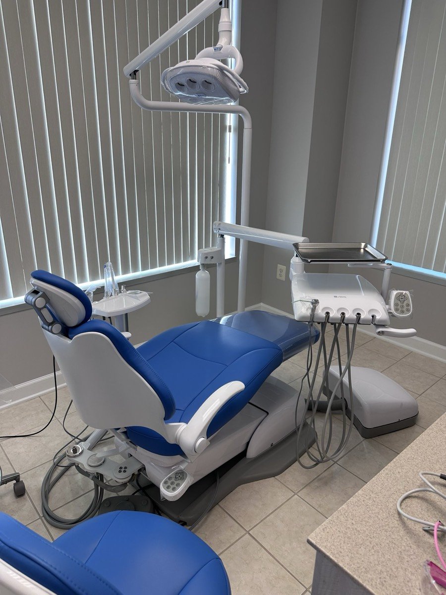 Dental chair at Clear Dental with comfort amenities in a bright, spotless room